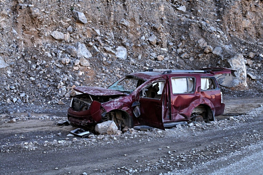 Wrecked car on the road leading to As Sayh village. Please drive responsibly.